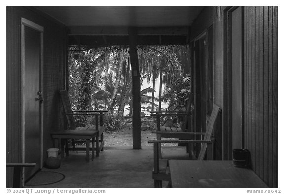 View of beach from open corridor of home, Tau Island. American Samoa (black and white)