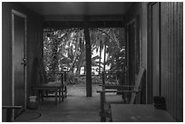 View of beach from open corridor of home, Tau Island. American Samoa ( black and white)