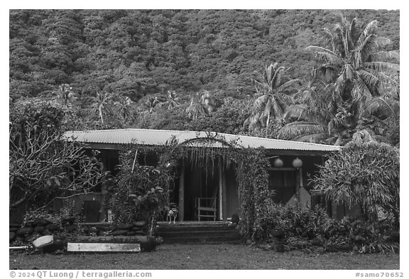 House and forested hill, Tau Island. American Samoa (black and white)