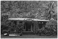 House and forested hill, Tau Island. American Samoa ( black and white)