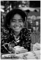Young incense vendor. Phnom Penh, Cambodia (black and white)