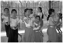 Girls learn traditional dancing at  Apsara Arts  school. Phnom Penh, Cambodia ( black and white)