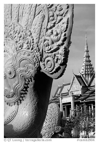 Statue and pagoda, Royal palace. Phnom Penh, Cambodia (black and white)