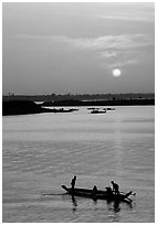 Boat and sunrise, Tonle Sap,  Phnom Phen. Cambodia ( black and white)