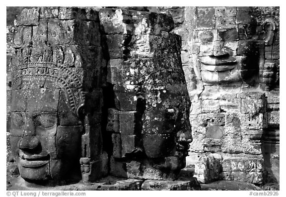 Large stone faces occupying towers, the Bayon. Angkor, Cambodia (black and white)