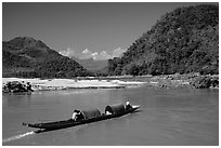 Narrow live-in boat. Mekong river, Laos ( black and white)