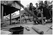 Preparation of rice in a small hamlet. Mekong river, Laos ( black and white)