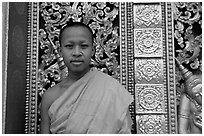 Buddhist novice monk at Wat Xieng Thong. Luang Prabang, Laos ( black and white)