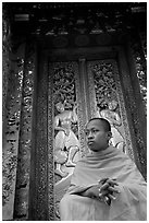 Buddhist novice monk at Wat Xieng Thong. Luang Prabang, Laos ( black and white)