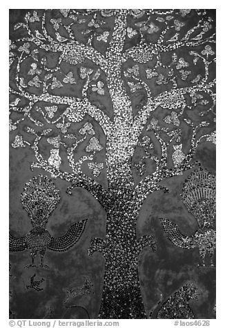 Mosaic of the tree of life on the Sim of Wat Xieng Thong. Luang Prabang, Laos (black and white)