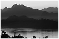 Hills, sunset on the Mekong river. Luang Prabang, Laos ( black and white)