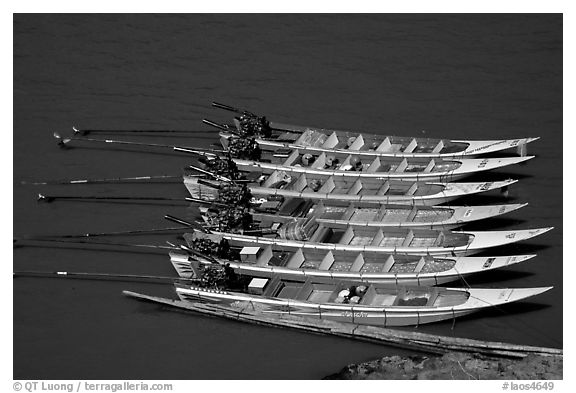 Fast boats on the Mekong river. With their 40 HPW Toyota engines, they cruise at 50 mph on the river. Mekong river, Laos (black and white)