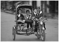 Motorized rickshaw, typical of this area. Luang Prabang, Laos ( black and white)
