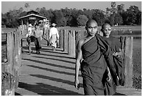 On the two century old U Bein bridge, Amarapura. Mandalay, Myanmar (black and white)