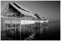 Huts on stilts in middle of lake. Inle Lake, Myanmar ( black and white)