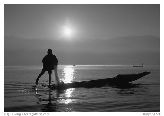 Intha fisherman, sunrise. Inle Lake, Myanmar