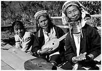 Three generations of Padaung women	singing. Shan state, Myanmar ( black and white)