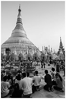 Praying from the Victory Ground, Shwedagon Pagoda, late afternoon. Yangon, Myanmar ( black and white)