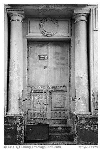 Door framed with columns. Yangon, Myanmar (black and white)