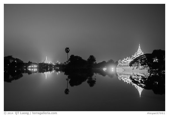 Shwedagon Pagoda and Karawek Hall reflected in Kandawgyi Lake. Yangon, Myanmar (black and white)