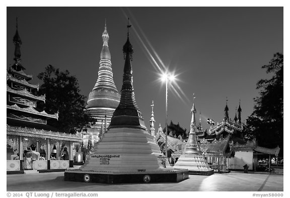 Shrines, stupas, and Main Stupa at dawn, Shwedagon Pagoda. Yangon, Myanmar (black and white)