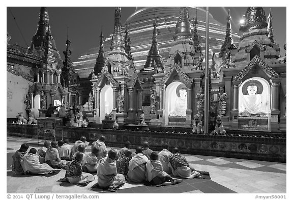 Nuns praying, Shwedagon Pagoda. Yangon, Myanmar (black and white)