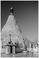 Man praying outside Botataung Pagoda main stupa. Yangon, Myanmar ( black and white)