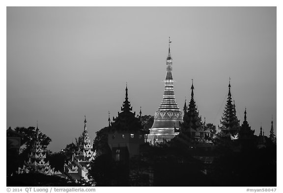 Distant view of Naungdawgyi Pagoda and shrines at dawn. Yangon, Myanmar (black and white)