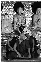 Monks and buddha statues, Shwedagon Pagoda. Yangon, Myanmar ( black and white)