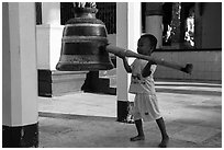 Child ringing bell, Shwedagon Pagoda. Yangon, Myanmar ( black and white)