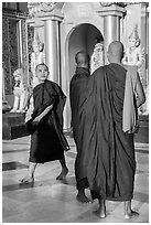 Monks on platform, Shwedagon Pagoda. Yangon, Myanmar ( black and white)