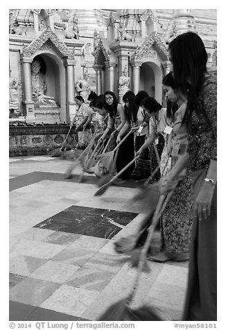 Women sweeping platform, Shwedagon Pagoda. Yangon, Myanmar (black and white)