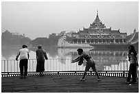 People exercising in front of Karawiek Hall. Yangon, Myanmar ( black and white)