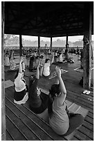 Women exercising in pavillion on Kandawgyi lake. Yangon, Myanmar ( black and white)