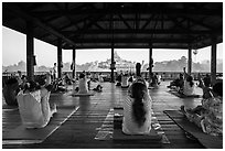 Women exercising in pavillion on Kandawgyi lake near Karawiek Hall. Yangon, Myanmar ( black and white)