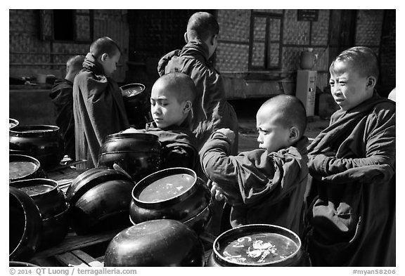 Novices getting ready for lunch, Nyaung U. Bagan, Myanmar (black and white)