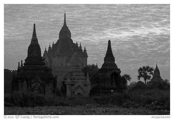Temples profiled against brilliant sunrise sky. Bagan, Myanmar (black and white)