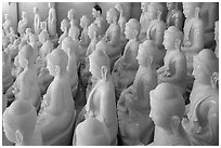 White marble buddha statues for sale. Mandalay, Myanmar ( black and white)