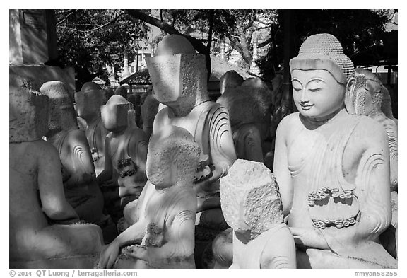 Buddha statues in various stages of completion on Marble street. Mandalay, Myanmar (black and white)