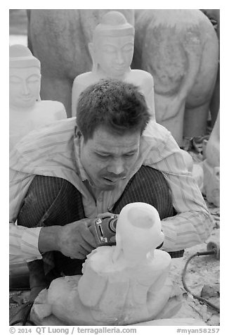 Sculptor with face covered in fine marble dust. Mandalay, Myanmar (black and white)