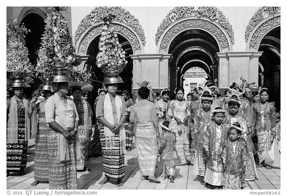 Young children and families gathering for noviciation ceremony, Mahamuni Pagoda. Mandalay, Myanmar (black and white)