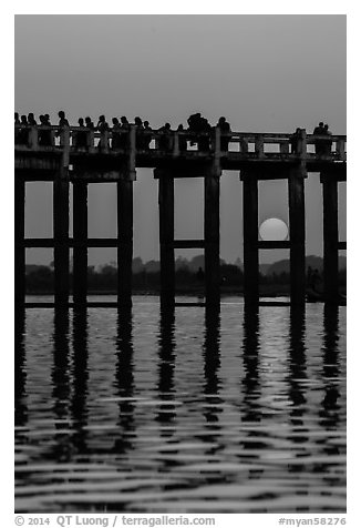 Sun setting behind U Bein Bridge. Amarapura, Myanmar (black and white)