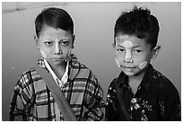 Boys wearing thanaka paste. Mandalay, Myanmar ( black and white)