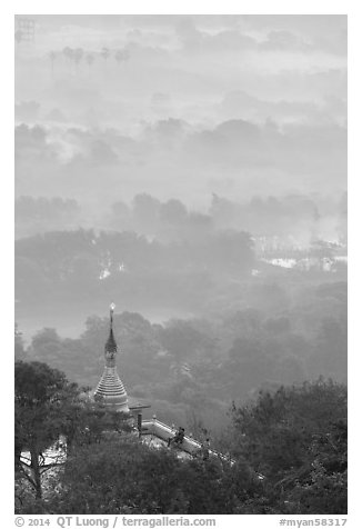 Stupa on Mandalay Hill overlooking misty plain. Mandalay, Myanmar (black and white)