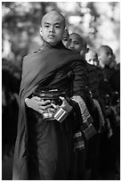 Monks stand in line before lunch, Mahagandayon Monastery. Amarapura, Myanmar ( black and white)