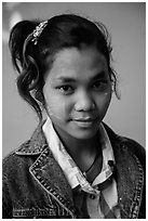 Woman with blue jeans jacket and thanaka paste. Mandalay, Myanmar ( black and white)