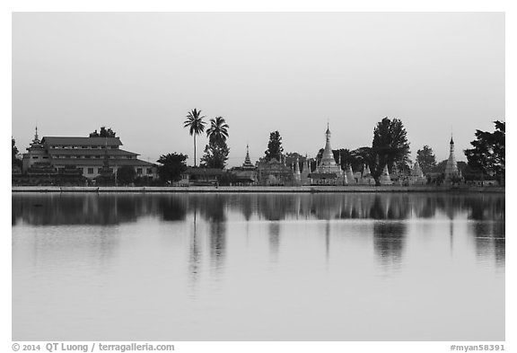 Pagoda reflected in Pone Tanoke Lake at dawn. Pindaya, Myanmar (black and white)