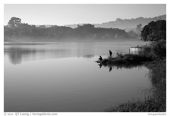 Men on shore of Pone Tanoke Lake. Pindaya, Myanmar (black and white)
