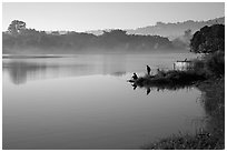 Men on shore of Pone Tanoke Lake. Pindaya, Myanmar ( black and white)