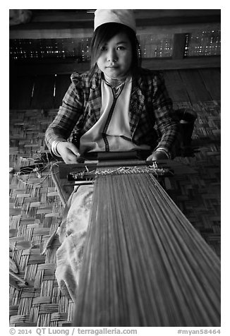 Young padaung woman weaving. Inle Lake, Myanmar (black and white)
